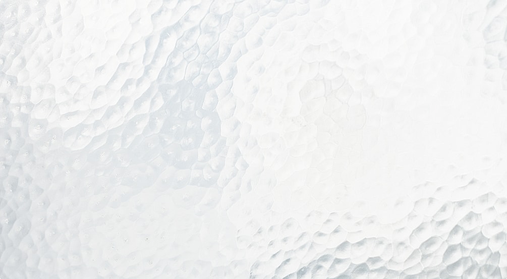 Textured frosted glass background in white.