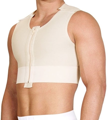 Smiling man in a black polo shirt.