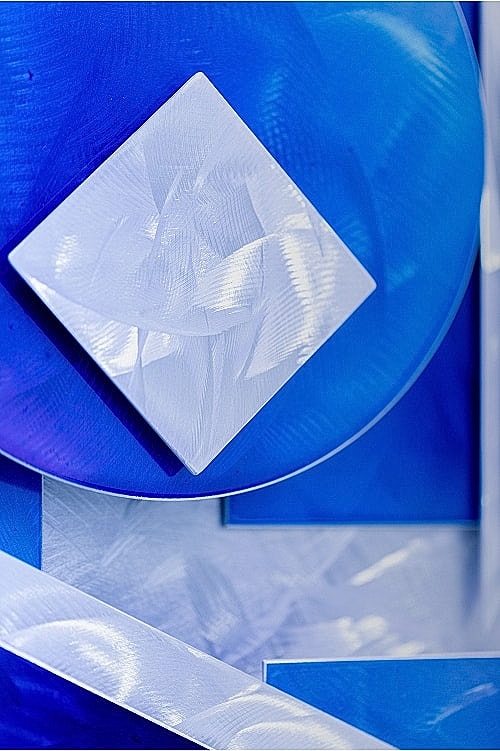 Abstract blue geometric shapes and textures.