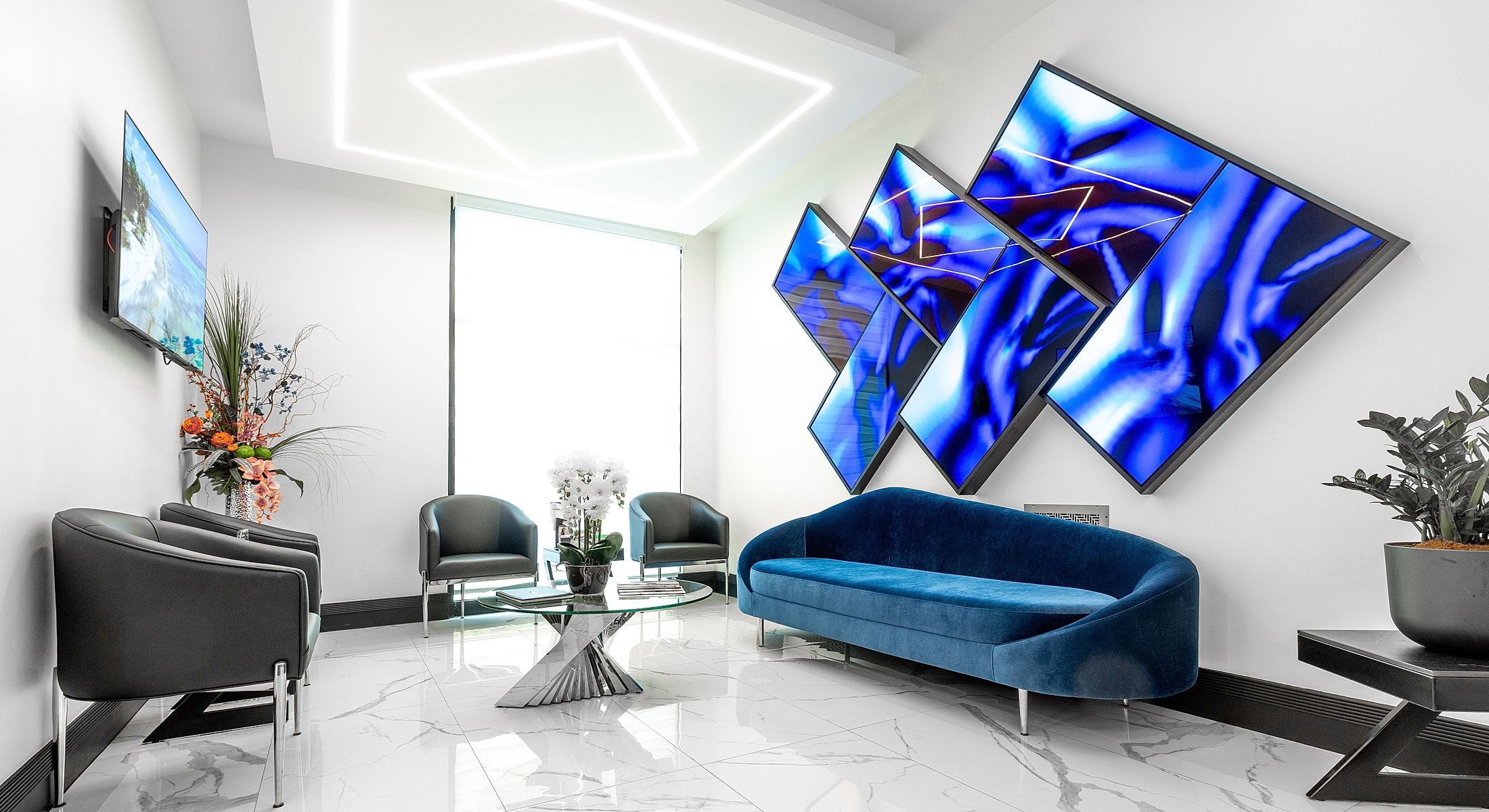 Modern waiting area with stylish decor and artwork.