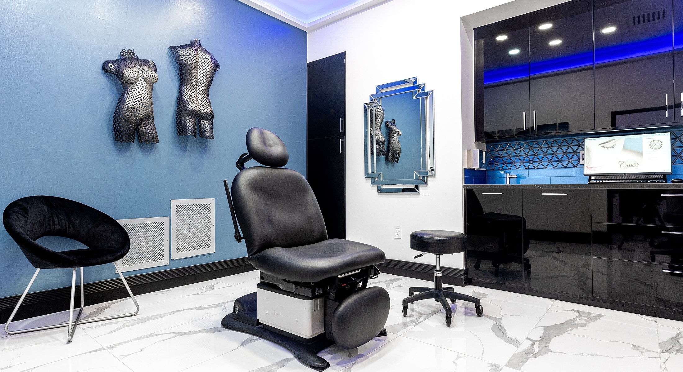Modern aesthetic treatment room with stylish decor.